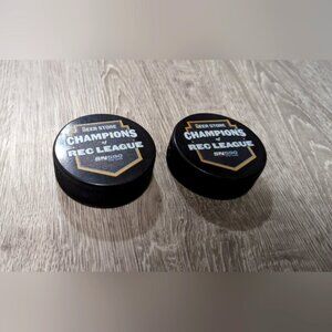Two Brand New Hockey Pucks